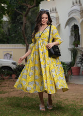 Printed Yellow Anarkali Dress with Puffy Sleeves and Flowing Design