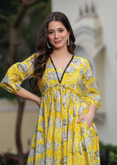Printed Yellow Anarkali Dress with Puffy Sleeves and Flowing Design